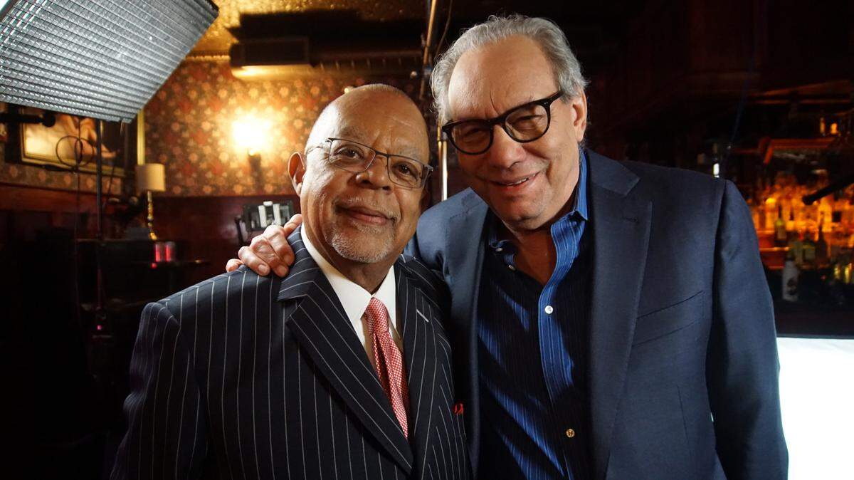 Henry Louis Gates Jr., left, with comedian Lewis Black in the Season 7 finale of “Finding Your Roots” on PBS.