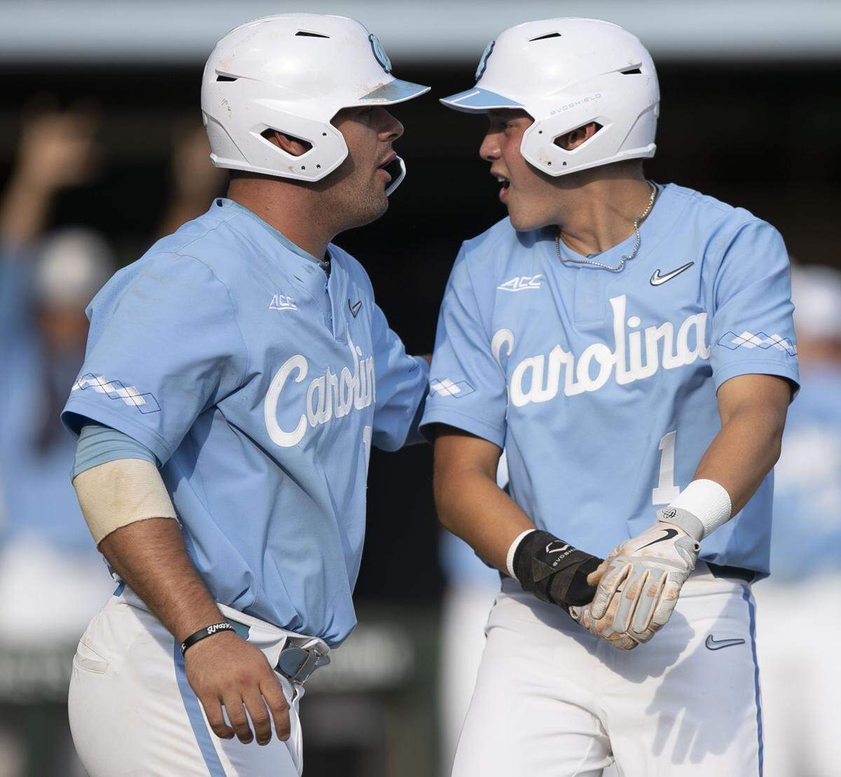 North Carolina’s Danny Serretti (1) and Aaron Sabato (19) react after they both scored on a single by Ashton McGee to give the Tar Heels’ a 2-0 lead over Tennessee in the first inning during the NCAA regional championship game on Sunday June 2, 2019 at Boshamer Stadium in Chapel Hill, N.C.