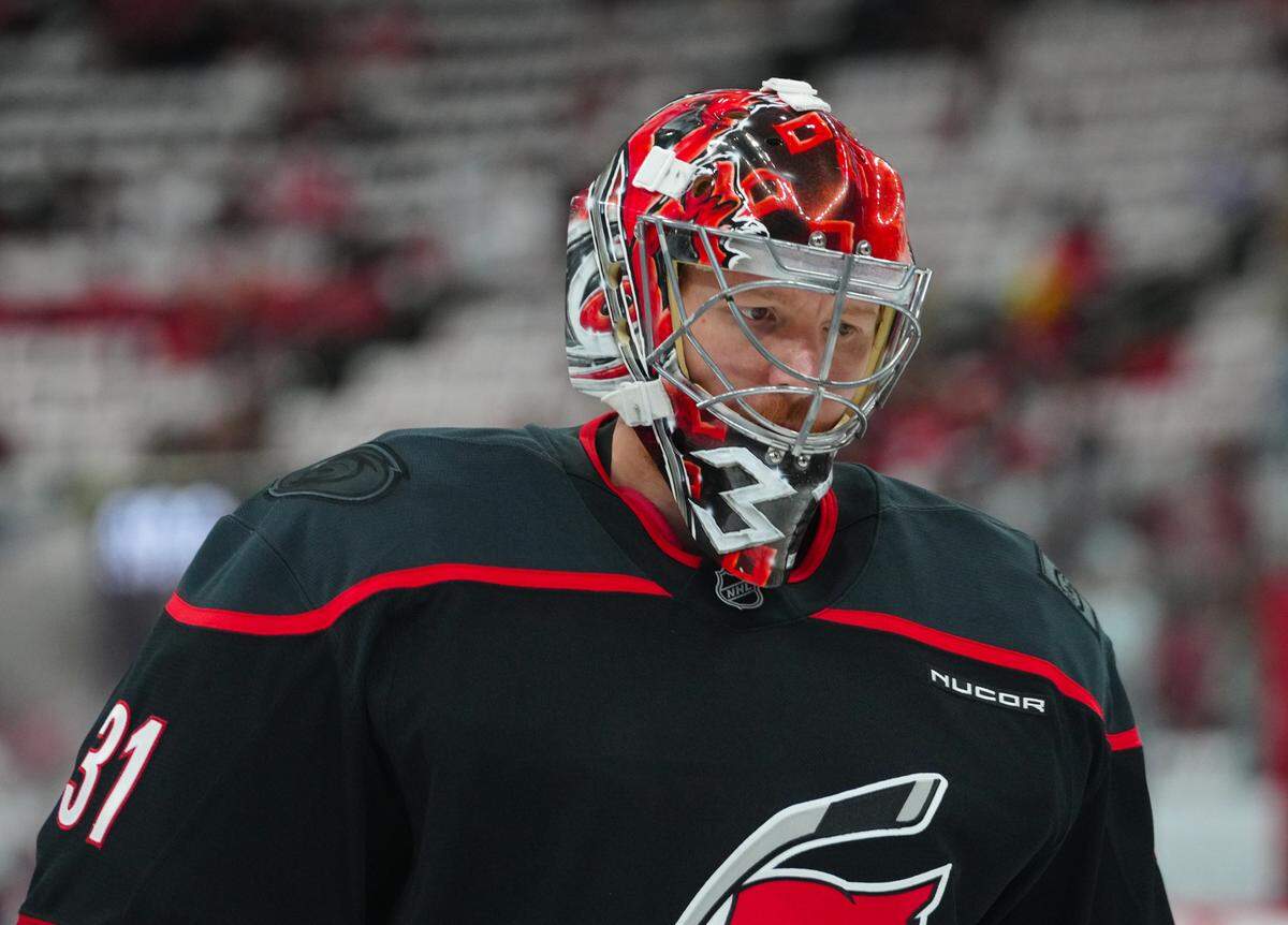 May 10, 2025; Raleigh, North Carolina, USA; Carolina Hurricanes goaltender Frederik Andersen (31) looks on during the warmups before the game against the Washington Capitals in game three of the second round of the 2025 Stanley Cup Playoffs at Lenovo Center. Mandatory Credit: James Guillory-Imagn Images