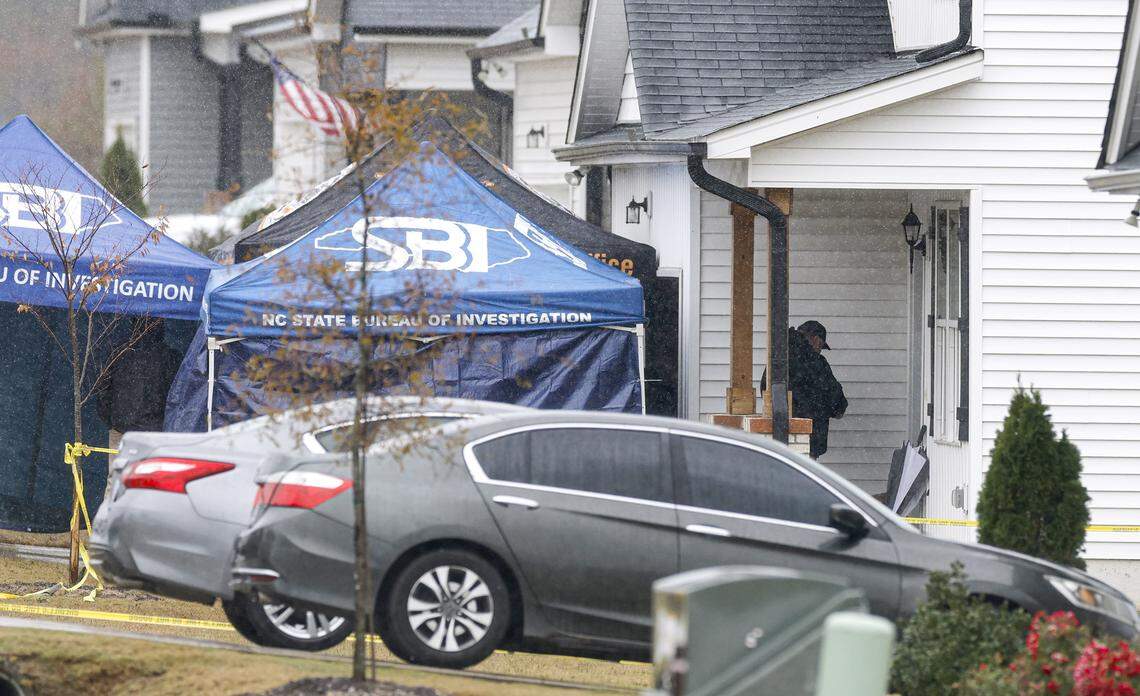 Investigators work at a home on Springtooth Drive in Zebulon, N.C., on Tuesday, Oct. 28, 2025.