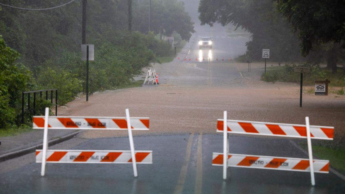 Thompson Street in Pittsboro, North Carolina, is closed after heavy rain from Tropical Storm Chantal brought flash flooding to the region on Sunday, July 6, 2025.