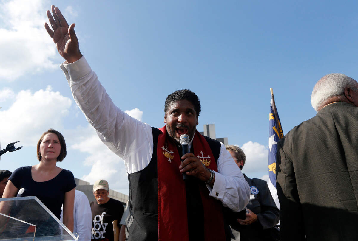 The Rev. William Barber speaks during “Moral Monday” protests on Halifax Mall in Raleigh, N.C., Monday, July 22, 2013.