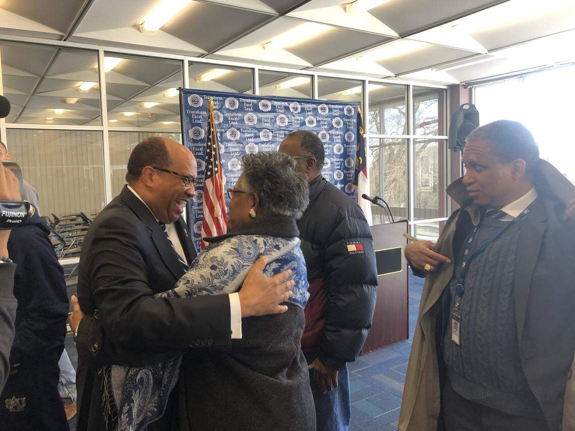 Everett Ward, president of St. Augustine’s University in Raleigh, hugs Linda Hubbard Curtis, the vice president of academic affairs, after announcing on Dec. 11, 2018 that the university is no longer under probation from its accreditation agency.