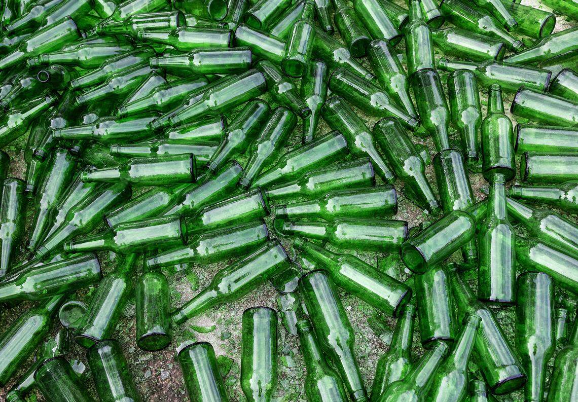 A pile of bottles is photographed at Strategic Materials, Inc. in Wilson, N.C. on Wednesday, Jan. 18, 2023.