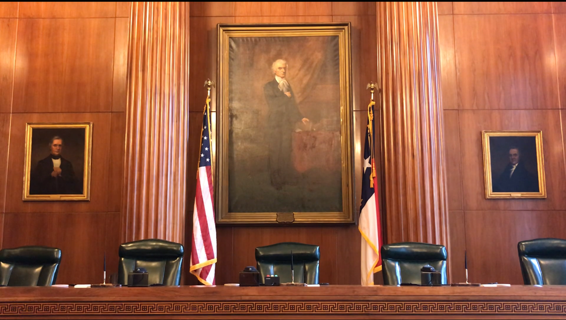 Justice Thomas Ruffin’s portrait dominates the paneled courtroom of the N.C. Supreme Court.