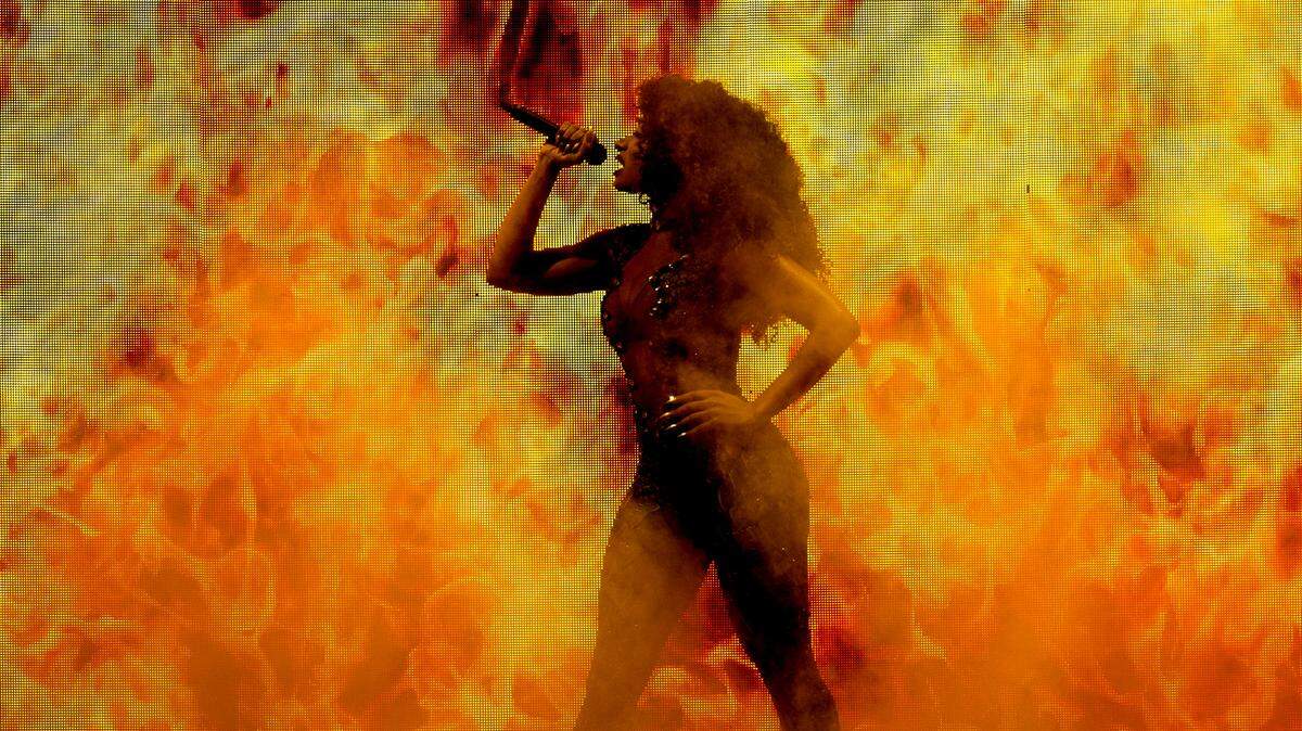 Megan Thee Stallion performs on her “Hot Girl Summer Tour” at Raleigh, N.C.’s PNC Arena, Tuesday night, June 4, 2024.