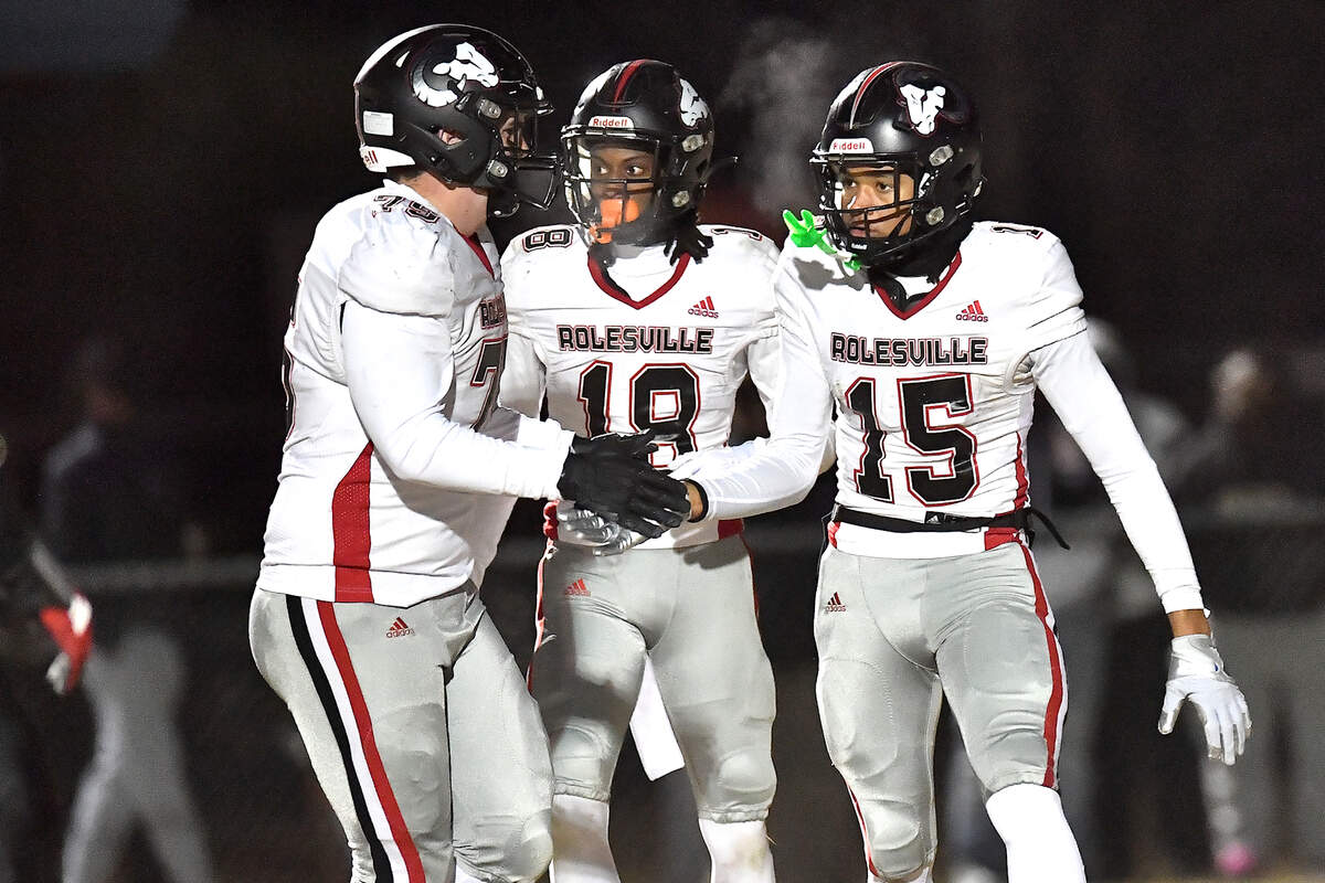 Rolesville’s Anthony Roberts (15) celebrates his touchdown against Cleveland with teammates in the second half. The Rolesville Rams and the Cleveland Rams met in the fourth round of the NCHSAA 4A football playoffs in Clayton, N.C. on December 6, 2024.
