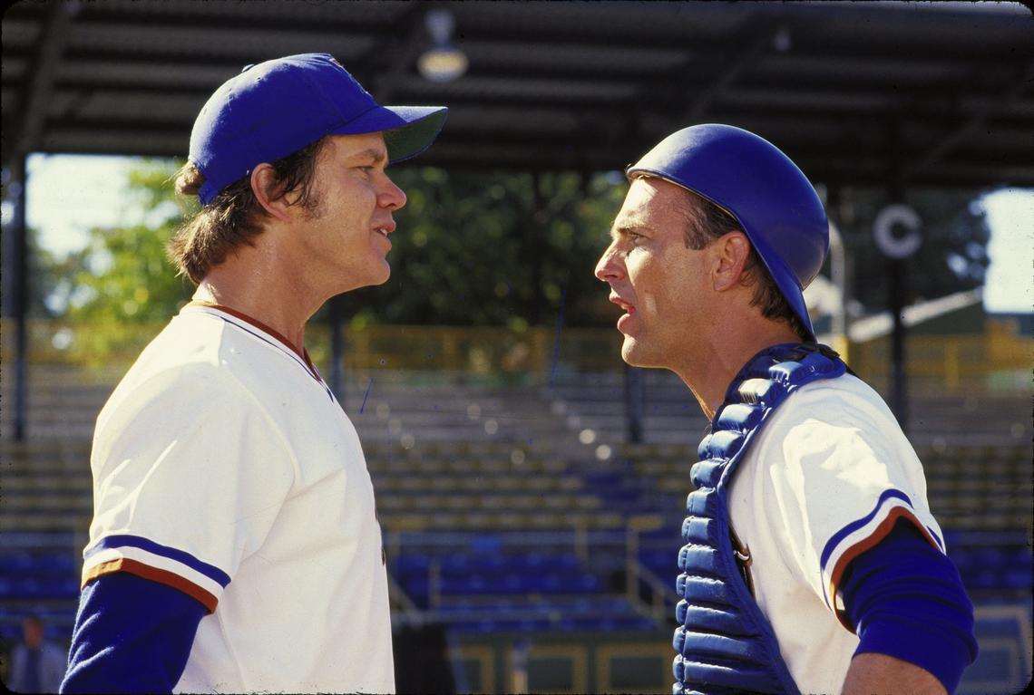 Tim Robbins (pitcher ‘Nuke’ LaLoosh), left, and Kevin Costner (catcher Crash Davis) star in the movie “Bull Durham,” which was filmed in and around Durham, NC.