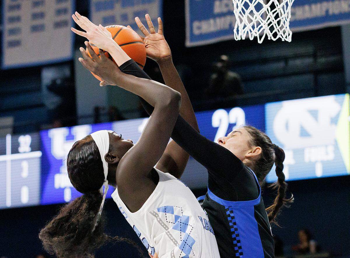 North Carolina’s Maria Gakdeng powers to the basket against Kentucky’s Clara Silva during the first half of the Tar Heels’ game on Thursday, Dec. 5, 2024, at Carmichael Arena in Chapel Hill, N.C.