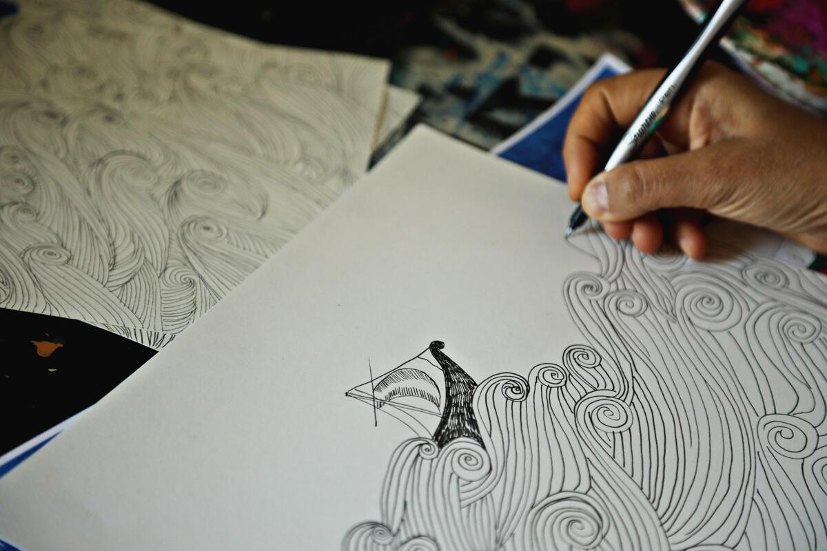 Kulsum Tasnif works on a sketch in her Raleigh home studio Friday, Feb. 1, 2019.
