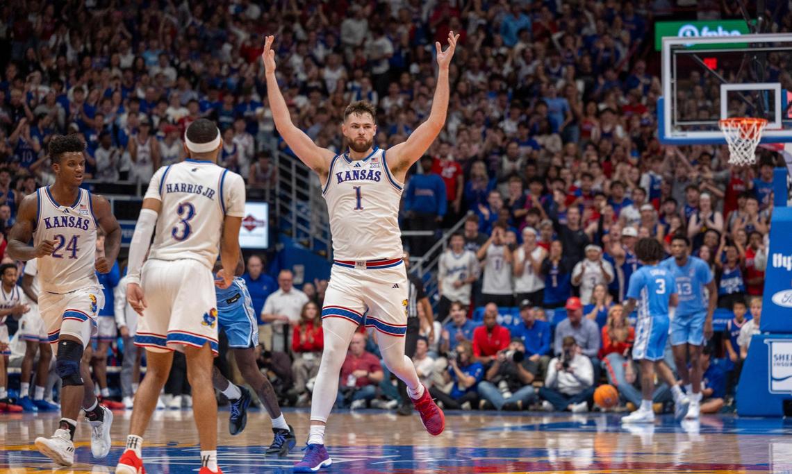 With the score tied 87-87, and two minutes to play, Kansas center Hunter Dickinson (1) motions to the crowd to get behind the team, in the final minutes of play against North Carolina on Friday, November 8, 2024 at Allen Fieldhouse in Lawrence, Kansas.