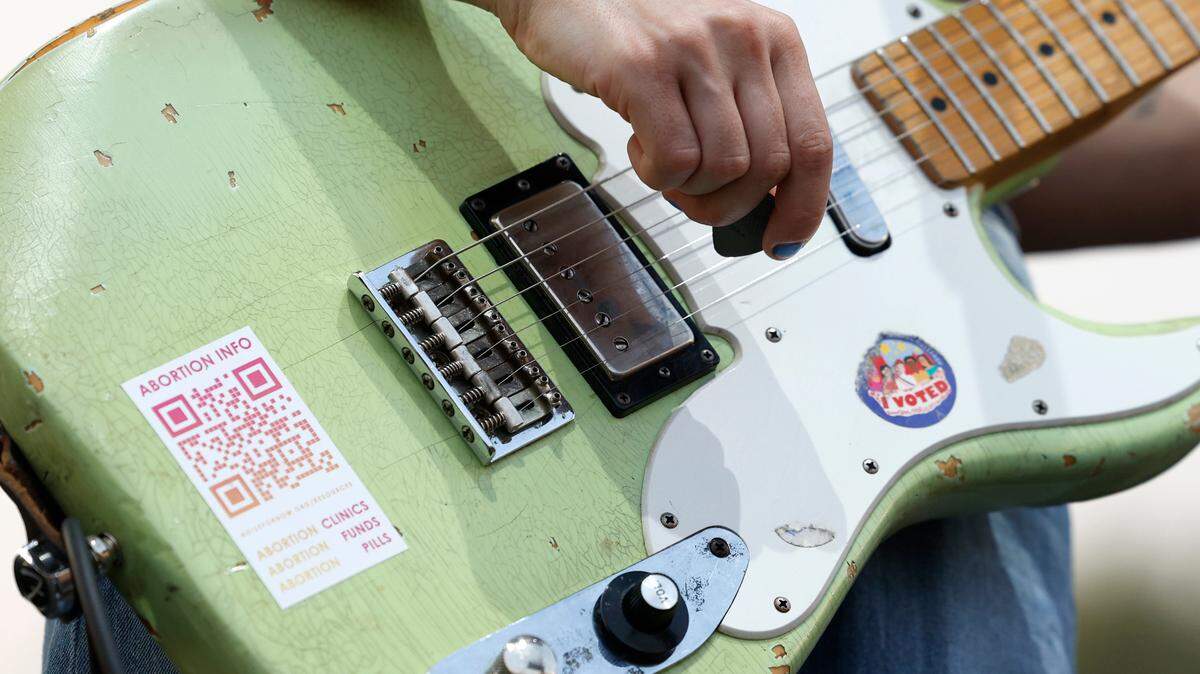 Iconic rock band Pearl Jam is visiting Raleigh in May. (Pictured: Alicia Bognanno plays her guitar as Bully opens for the Pixies during a concert at Red Hat Amphitheater in Raleigh, N.C., Friday, June 16, 2023.)