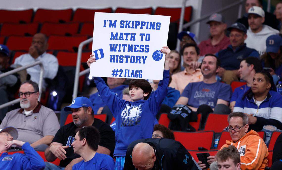 A fan cheers on the Blue Devils during the second half of Duke’s 93-49 victory over Mount St. Mary’s in the first round of the 2025 NCAA Men’s Basketball Tournament at the Lenovo Center in Raleigh, N.C., Friday, March 21, 2025.