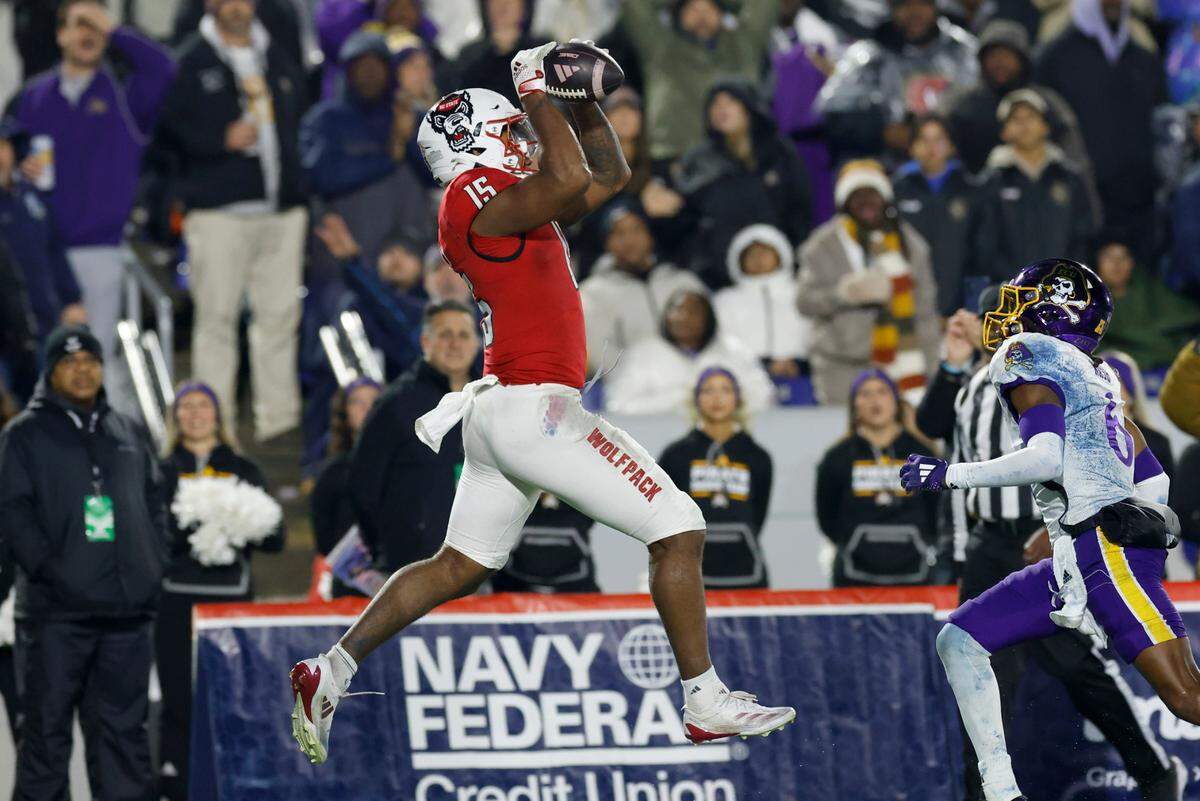 N.C. State tight end Justin Joly (15) pulls in a 15-yard touchdown reception during the second half of ECU’s 26-21 victory over N.C. State in the Military Bowl at Navy-Marine Corps Memorial Stadium in Annapolis, Md., Saturday, Dec. 28, 2024.