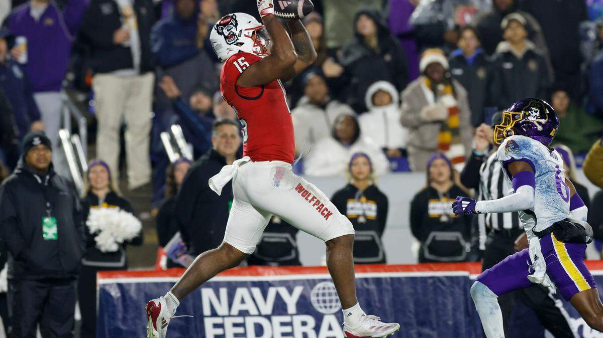 N.C. State tight end Justin Joly (15) pulls in a 15-yard touchdown reception during the second half of ECU’s 26-21 victory over N.C. State in the Military Bowl at Navy-Marine Corps Memorial Stadium in Annapolis, Md., Saturday, Dec. 28, 2024.