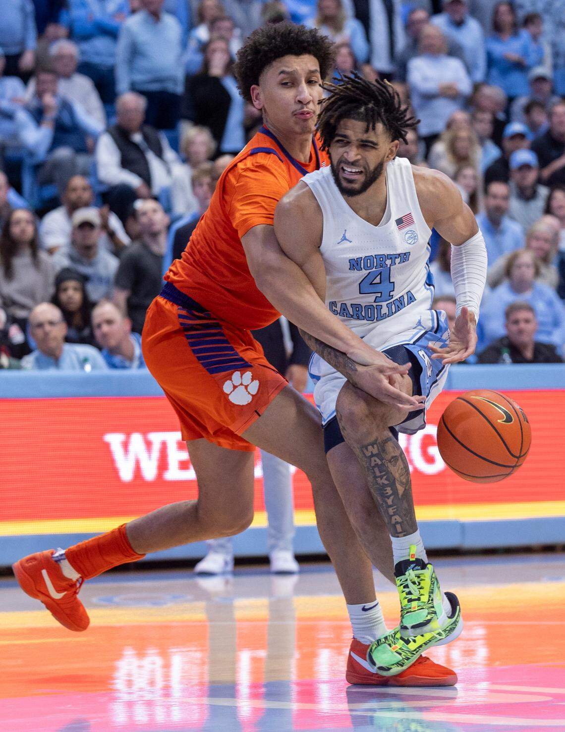 Clemson’s Jack Clark (5) works to slow North Carolina’s R.J. Davis (4) in the second half on Tuesday, February 6, 2024 at the Dean E. Smith Center in Chapel Hill, N.C.