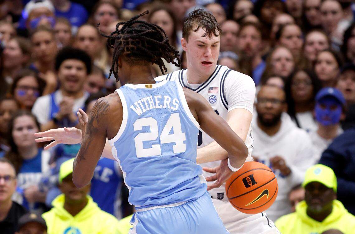 Duke’s Cooper Flagg (2) steals the ball from North Carolina’s Jae’Lyn Withers (24) during the second half of Duke’s 87-70 victory over UNC at Cameron Indoor Stadium in Durham, N.C., Saturday, Feb. 1, 2025.