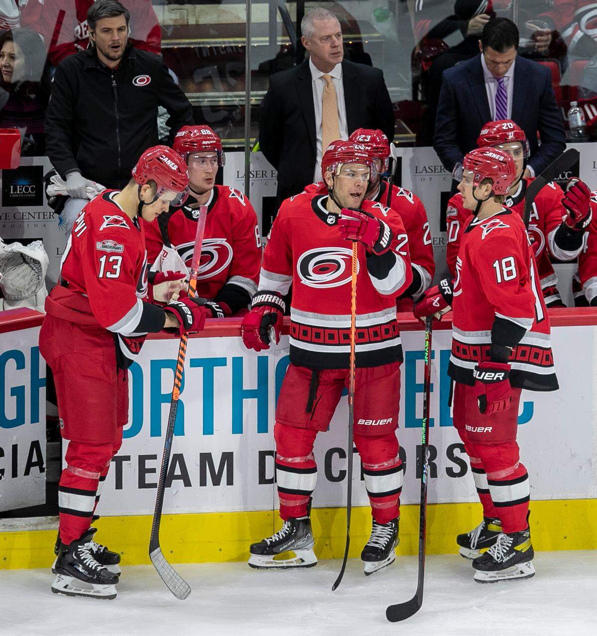 Carolina Hurricanes’ Jesse Piljujarvi (13), Paul Stastny (26) and Jack Drury (18) chat during a time out in the third period on Tuesday, April 11, 2023 at PNC Arena in Raleigh, N.C.