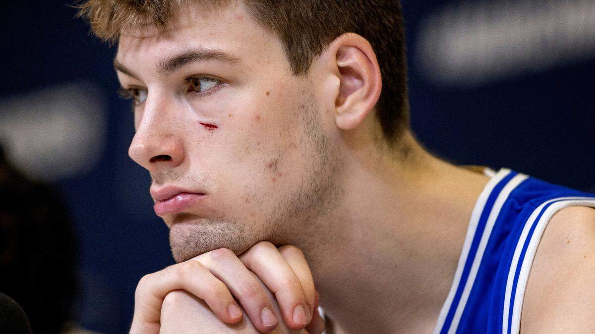 Duke’s Kyle Filipowski (30), with a cut under his eye from the game against Tennessee, listens to questions from the media following their 65-52 loss to Tennessee in the second round of the NCAA Tournament on Saturday, March 18, 2023 at the Amway Center in Orlando, Fla.
