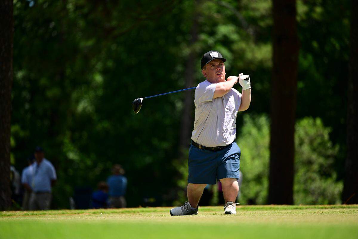 Conor Ennis, Short Stature, watches his tee shot on hole 14 during the first round at the 2022 U.S. Adaptive Open at Pinehurst Resort & C.C. (Course No. 6) in Village of Pinehurst, N.C. on Monday, July 18, 2022. (Robert Beck/USGA)