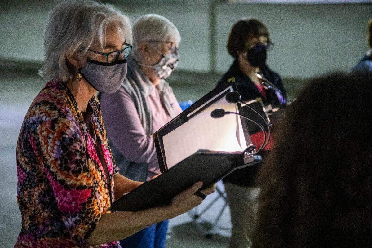 University Presbyterian Church Chapel Hill’s choir rehearses for the Easter 2021 worship services on Wednesday, March. 24, 2021at the James C Wallace Parking Deck in Chapel Hill. Easter will mark only the second time the church has held in-person worship since the beginning of the pandemic.