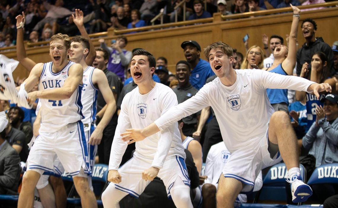Duke’s Jack White (41), Michael Savarino (30) and Keenan Worthington (45) react after a dunk by teammate Jordan Goldwire (14) in the second half against Fort Valley State on Wednesday, October 30, 2019 at Cameron Indoor Stadium in Durham, N.C.