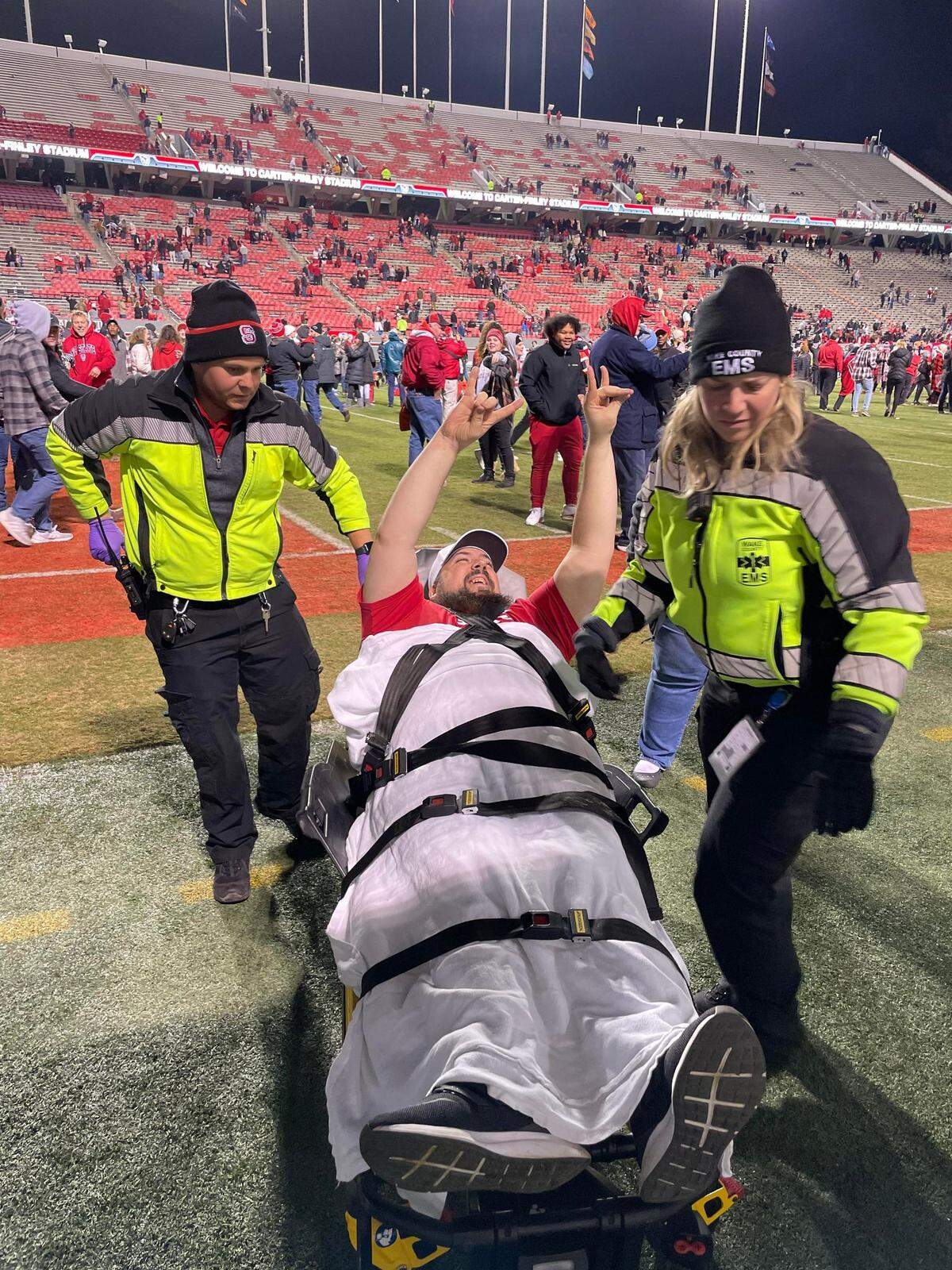 Lifelong NC State fan Greg Haas, 44, broke his leg in two places upon rushing the field at Carter-Finley Stadium after the team’s improbable come-from-behind win against North Carolina on Nov. 26, 2021.