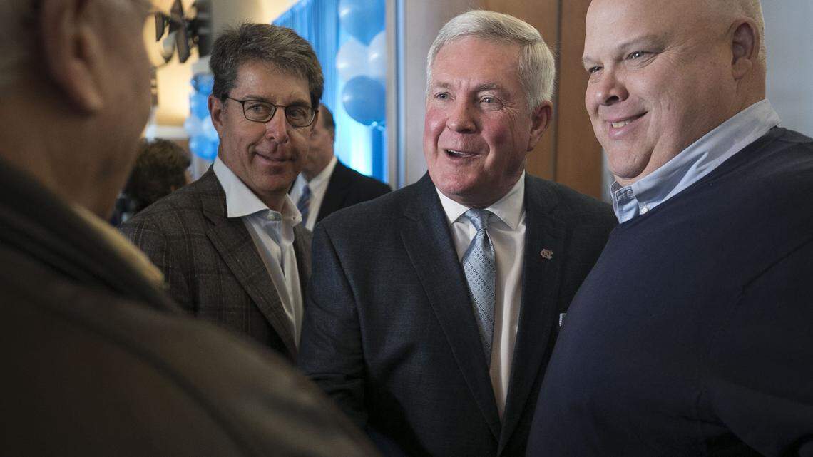 Newly named North Carolina football coach Mack Brown is surrounded by well wishers following his introduction and his first press conference as head coach on Tuesday, November 27, 2018 at Kenan Stadium in Chapel Hill, N.C.