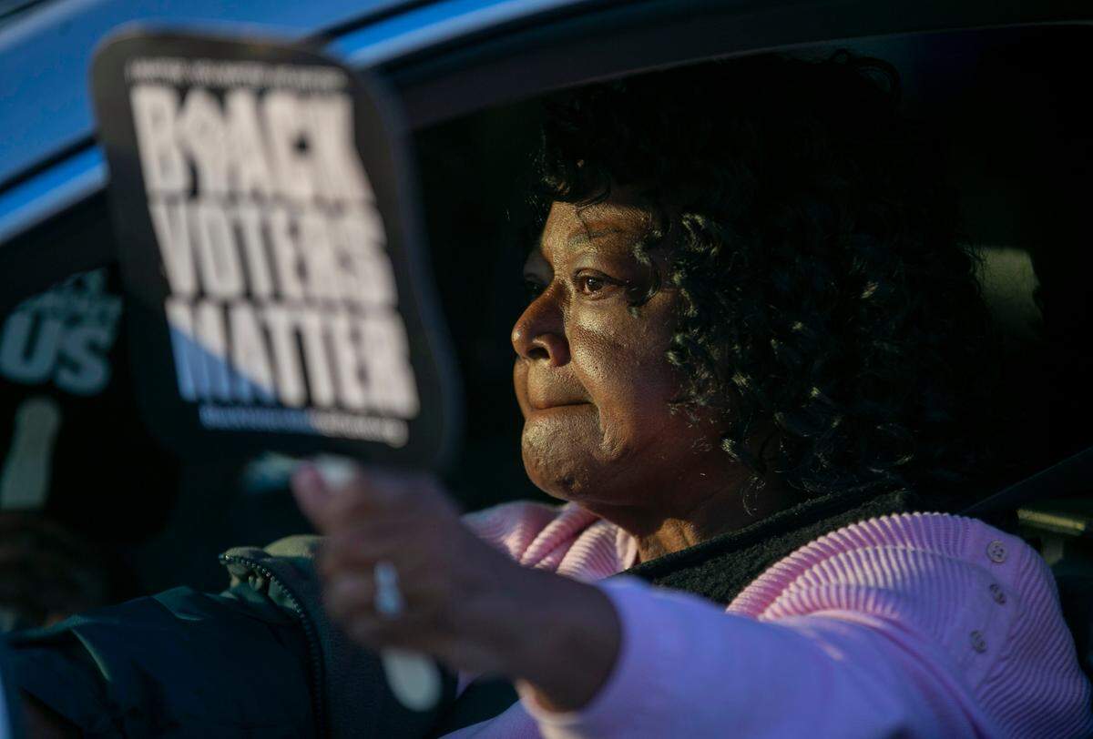 Lucy McMurrin Turner of Elizabeth City, NC participates in a demonstration form her van on Ehringhaus Street on Thursday, April 22, 2021 in reaction to the death of Andrew Brown Jr., who was shot by a Pasquotank County Deputy Sheriff on Wednesday.