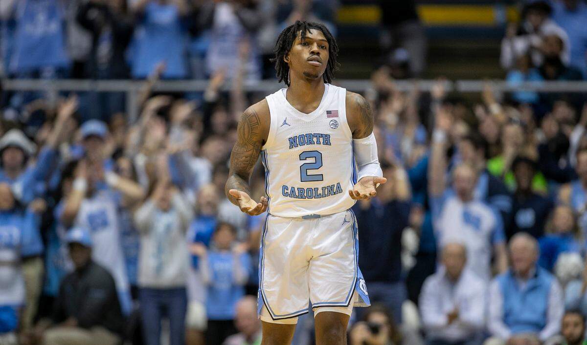 North Carolina’s Caleb Love (2) reacts after a basket in the first half against Virginia on Saturday, February 25, 2023 at the Smith Center in Chapel Hill, N.C.