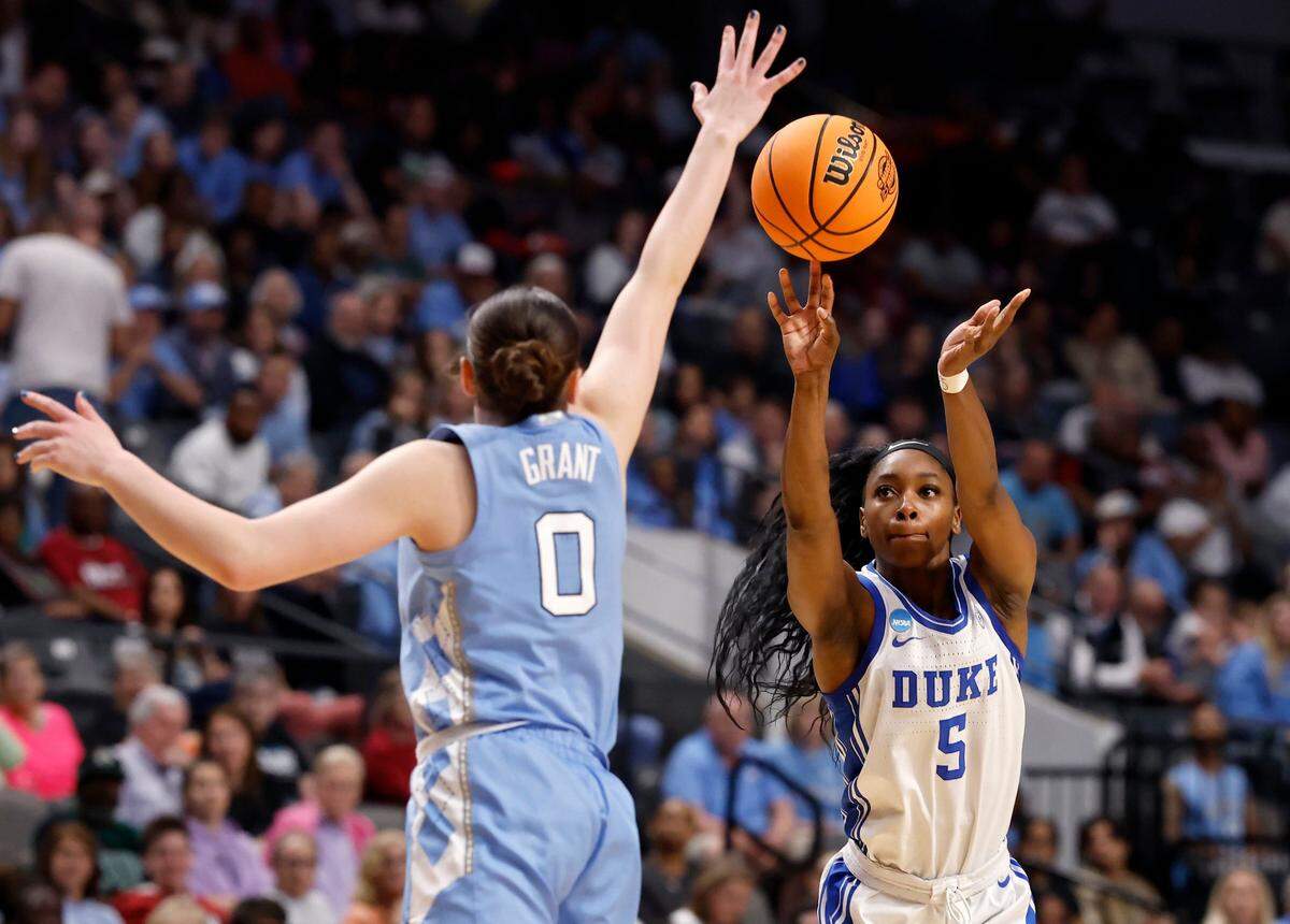 Duke’s Oluchi Okananwa shoots over North Carolina’s Lanie Grant during the second half of the Blue Devils’ 47-38 win in the Birmingham Regional of the NCAA Tournament at Legacy Arena on Friday, March 28, 2025 in Birmingham, Ala.