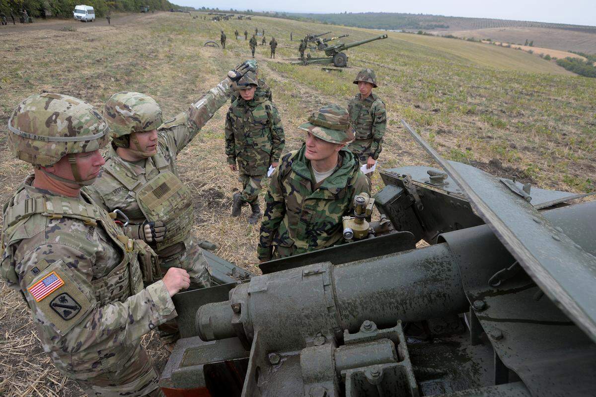 Soldiers from the North Carolina National Guard, left, learn more about Moldovan artillery training and tactics at the Bulboaca Training Area in Moldova in September 2019. The N.C. Guard has teamed with Moldova for more than two decades through the U.S. government’s State Partnership Program designed to increase peace and stability across Europe.