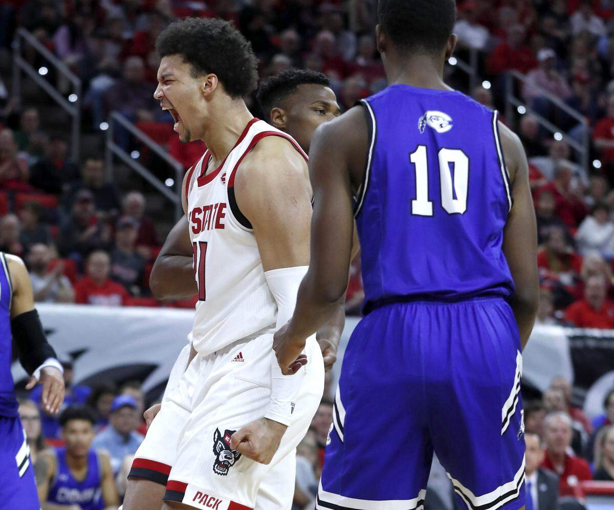 N.C. State’s Ian Steere celebrates slamming in two during the first half of N.C. State’s exhibition game against Chowan at PNC Arena in Raleigh, N.C., Monday, Oct. 29, 2018.