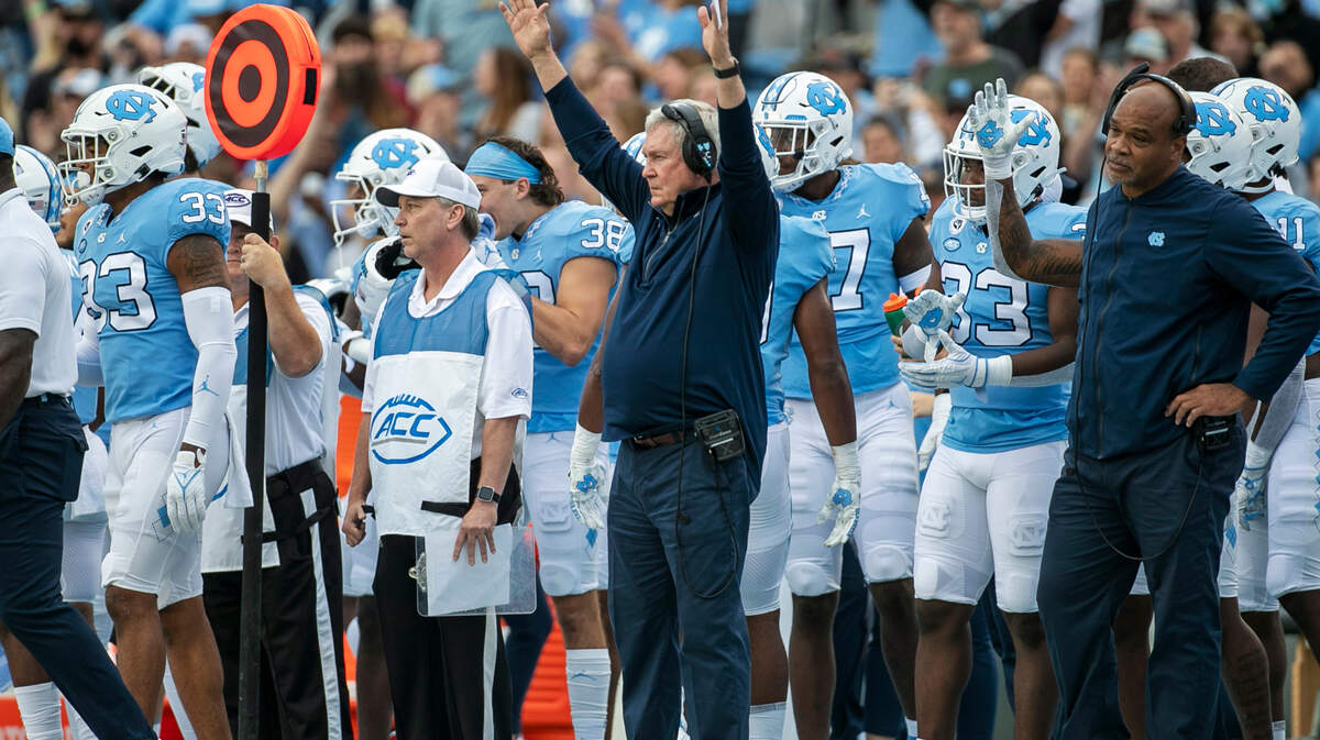 North Carolina coach Mack Brown signals after a 51-yard field goal by Grayson Atkins to give the Tar Heels a 3-0 lead over Florida State on Saturday, October 9, 2021at Kenan Stadium in Chapel Hill, N.C