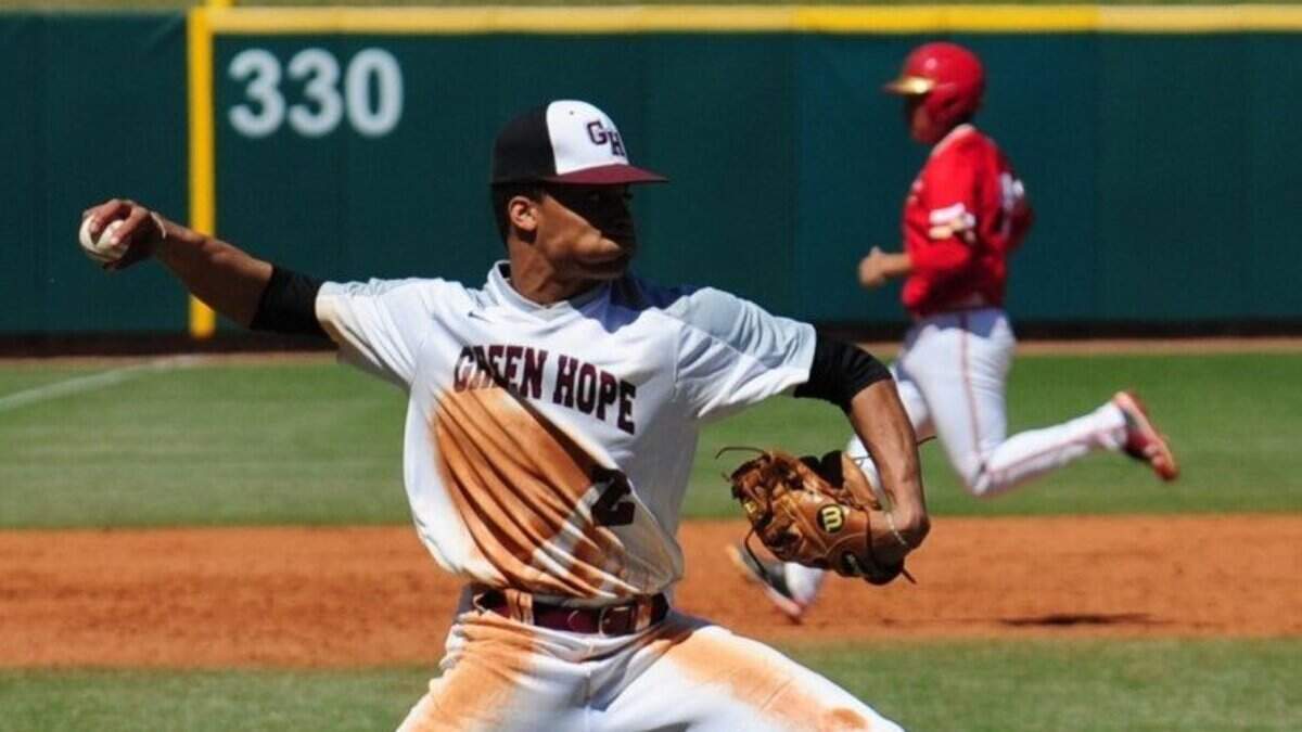 Green Hope pitcher Jordyn Adams fields a bunt and throws to first base. The Green Hope Falcons and the Orange Lutheran Lancers played the championship baseball game in the National High School Invitational tournament in Cary on Saturday, March 31, 2018.