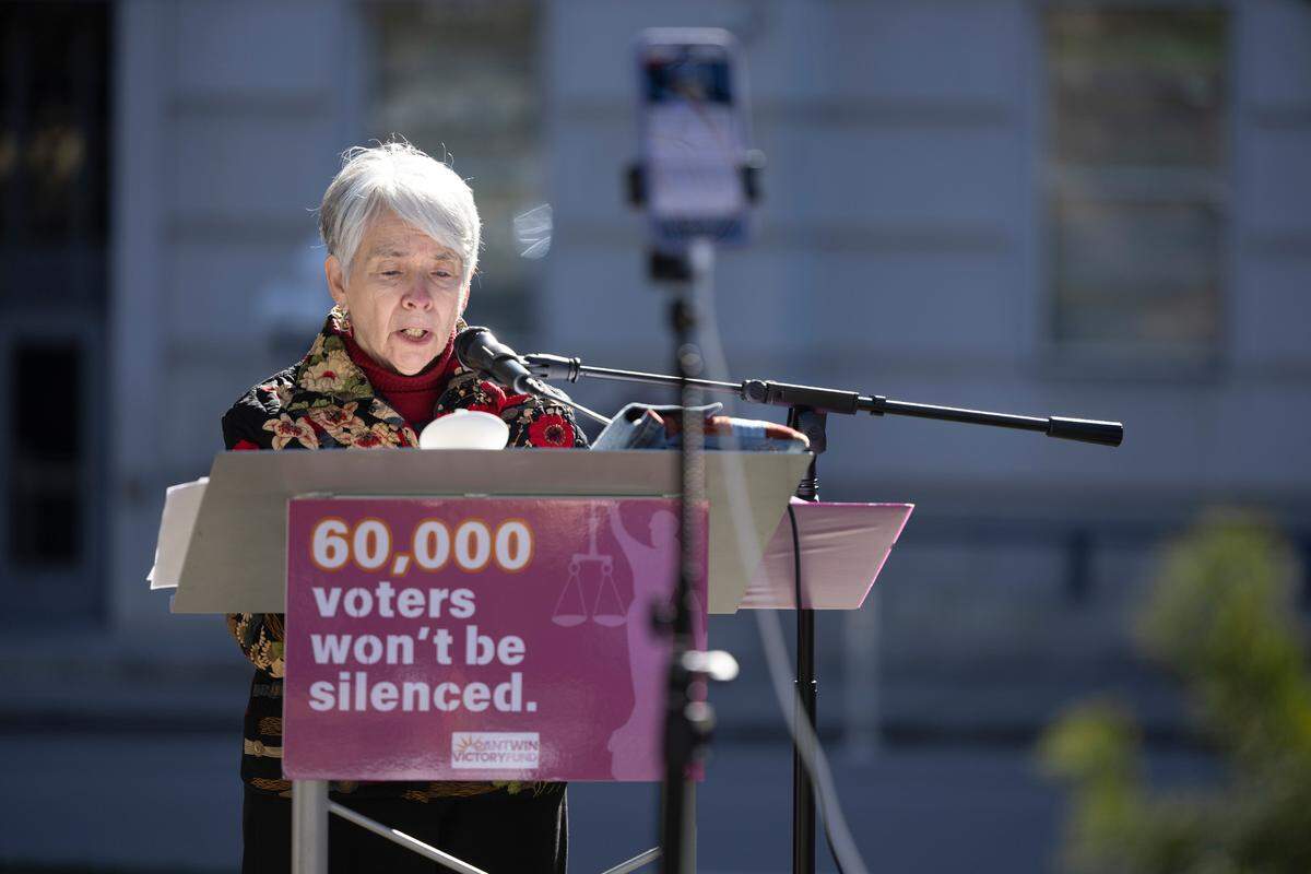 During a live-streamed event on the grounds of the North Carolina State Capitol, hosted by the Can’t Win Victory Fund, Vicki Ryder takes a turn reading the names of more than 60,000 ballots challenged by Republican Court of Appeals Judge Jefferson Griffin in a legal battle over the results of the state Supreme Court race.