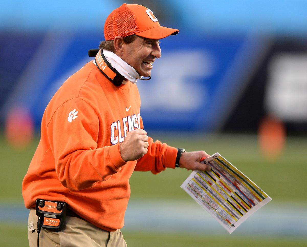 Clemson Tigers head coach Dabo Swinney celebrates the teamÕs play during second quarter action against Notre Dame at Bank of America Stadium on Saturday, December 19, 2020 in Charlotte, NC. The Clemson Tigers and Notre Dame Fighting Irish faced off in the ACC Championship game.