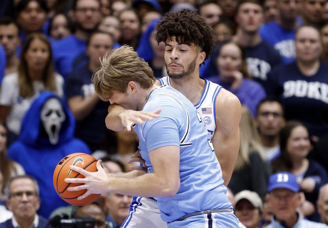 Duke’s Cameron Boozer (12) defends Indiana State's Derek Vorst (35) during the first half of Duke’s game against Indiana State at Cameron Indoor Stadium in Durham, N.C., Friday, Nov. 14, 2025.