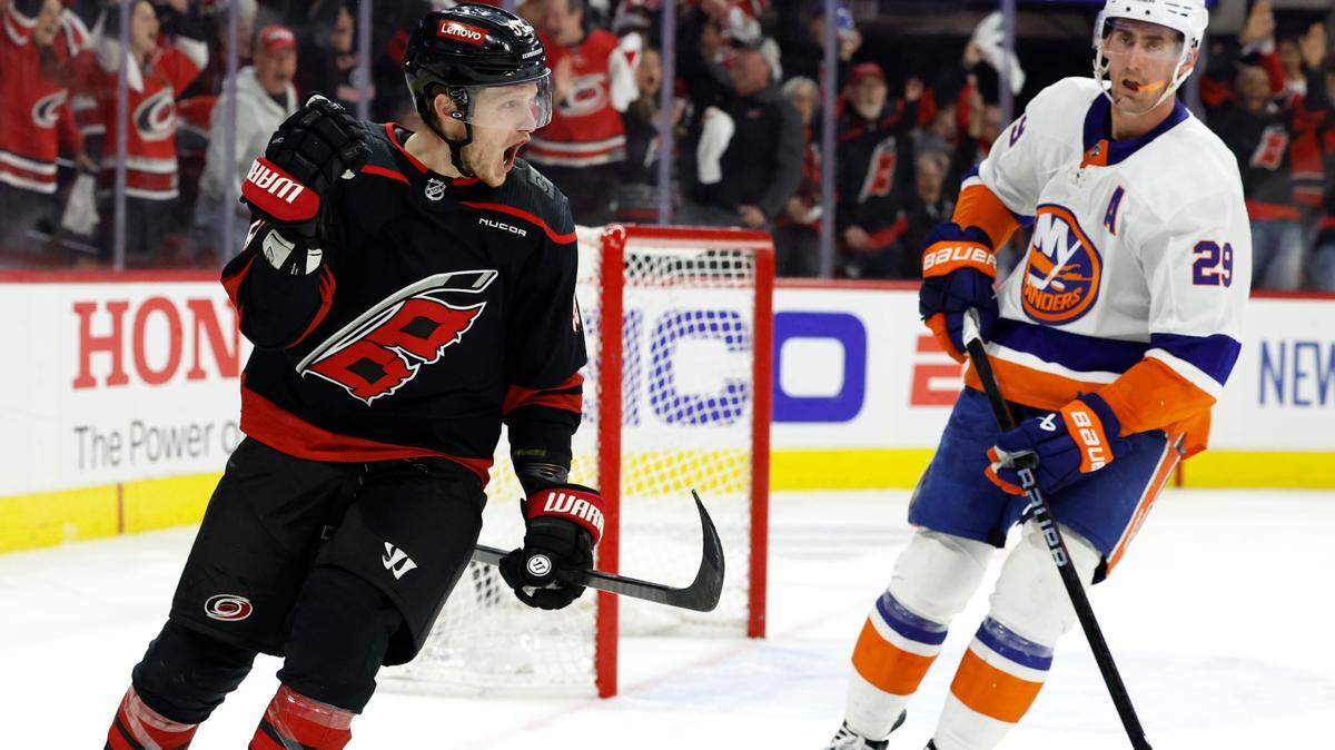 Carolina center Jake Guentzel (59) celebrates scoring an empty-net goal during the third period of the Hurricanes’ 5-3 victory over the Islanders in the first round of the Stanley Cup playoffs at PNC Arena in Raleigh, N.C., Monday, April 22, 2024.