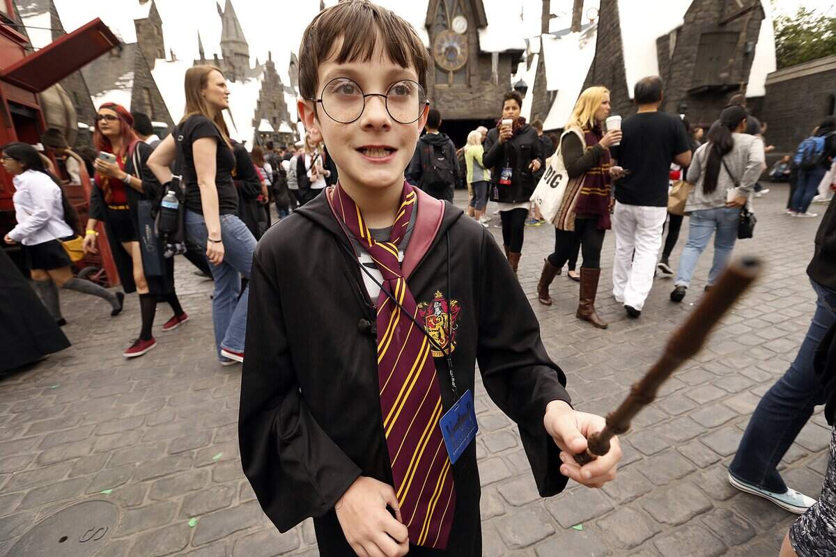 Pacey McWilliams 10, from Edmonton, Alberta, Canada, admires his new magic wand as he enters The Wizarding World of Harry Potter attraction at Universal Studios Hollywood in 2016. The Museum of Life & Science in Durham offers slightly less exhilarating experiences at day camp.