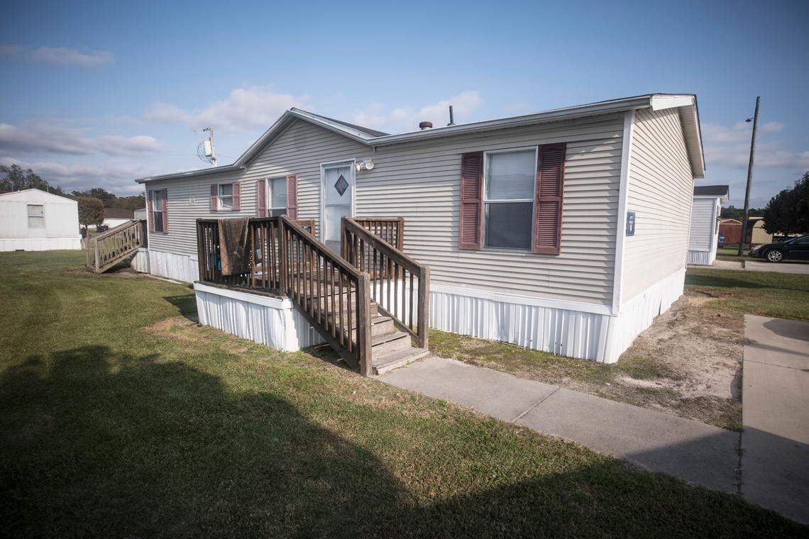 Charmain and Tony Hunt purchased a mobile home in Abbott Park in Lumberton, N.C., pictured here on Friday, Oct. 16, 2020, through Time Out Communities. They moved to the home in May of 2020 and discovered that the air conditioning unit blew out hot air. They each worked extra hours to pay for repairs by mid-summer, but in the meantime struggled with the impacts of increasing summer heat on their health.