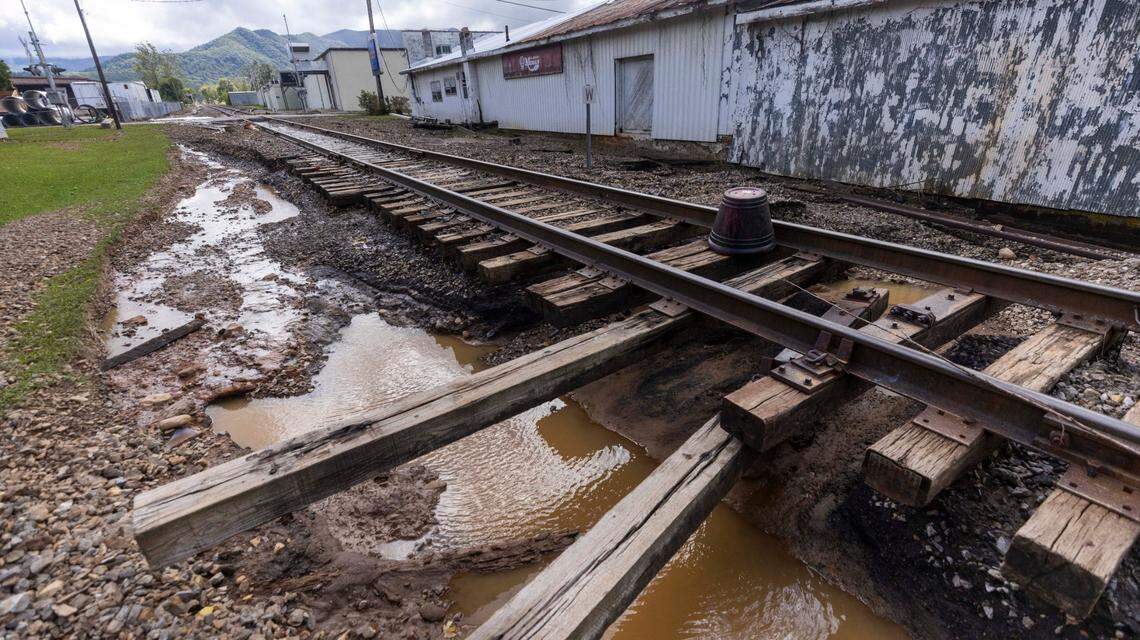 Railroad tracks are damaged by floodwaters in Waynesville on Friday, Sept. 27, 2024 as the remnants of Hurricane Helene caused flooding, downed trees, and power outages in western North Carolina.