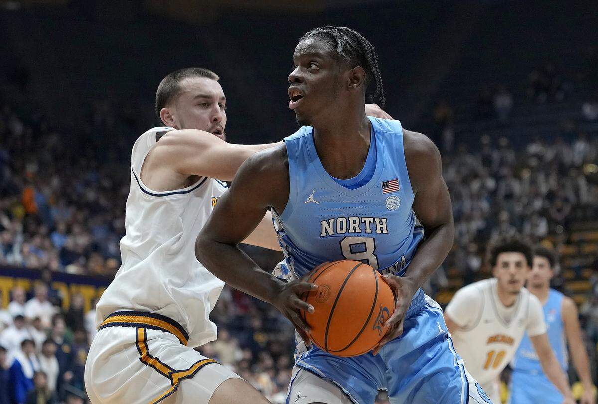 UNC’s Caleb Wilson (8) is guarded by Cal’s John Camden in the first half at Haas Pavilion on Jan. 17, 2026, in Berkeley, California.