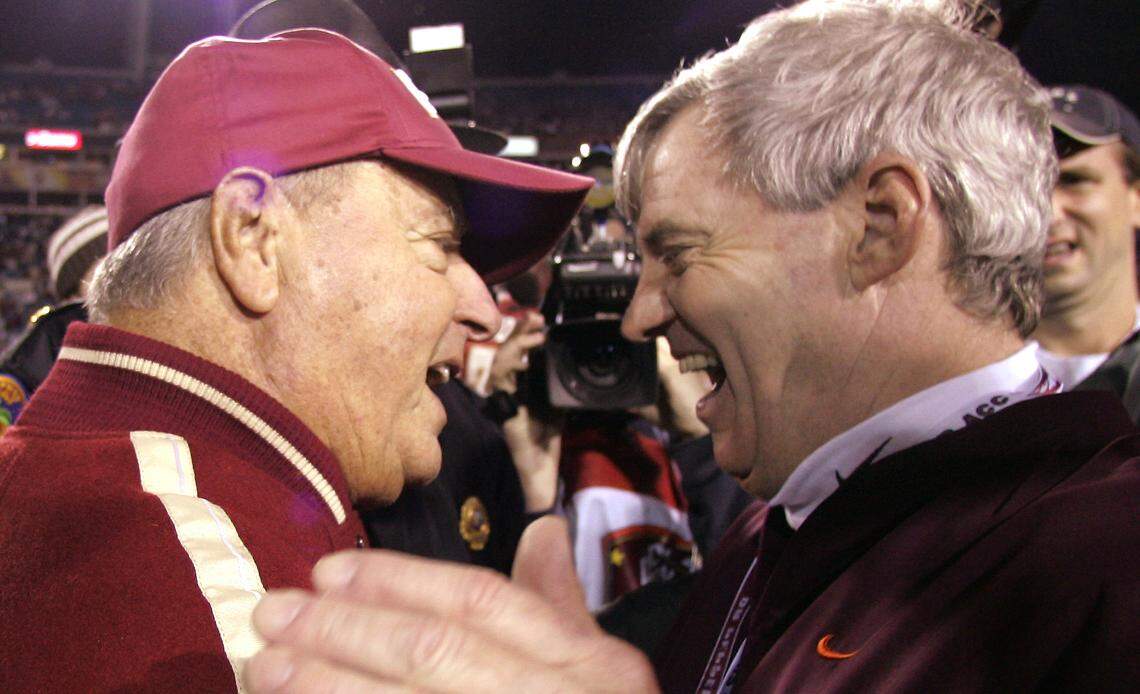 Florida State coach Bobby Bowden, left, is congratulated by Virginia Tech coach Frank Beamer following the Seminoles’ 27-22 win in the ACC Championship game at Alltel Stadium in Jacksonville, Fla., on Saturday, Dec. 3, 2005. 