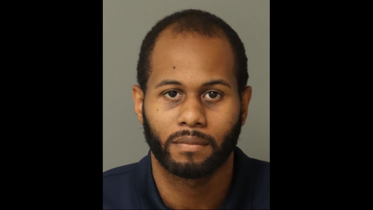 Former Raleigh Police Officer Tremale Cogdell is being investigated by the FBI. The News & Observer does not publish mugshots as a general rule. We are making an exception in this case because the FBI is looking for possible victims and the photo might help them identify him.