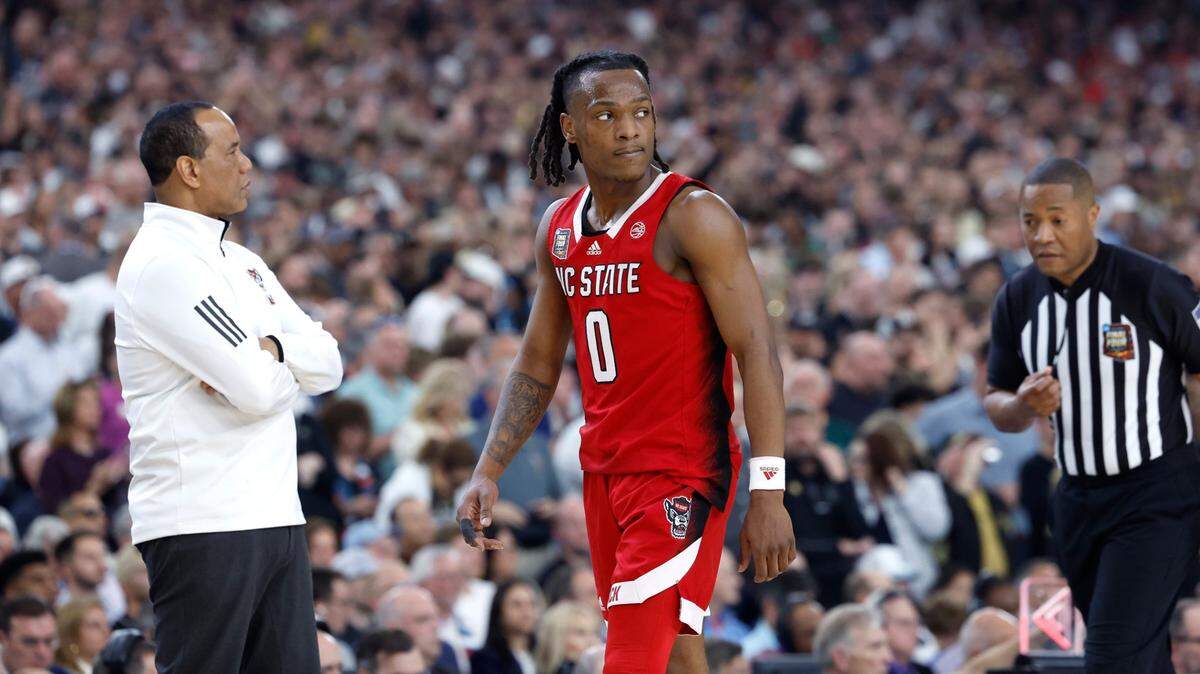 N.C. State’s DJ Horne (0) walks back towards the Wolfpack bench late in the second half of against Purdue’s 63-50 victory over N.C. State in the NCAA Tournament national semifinals at State Farm Stadium in Glendale, Ariz., Saturday, April 6, 2024.