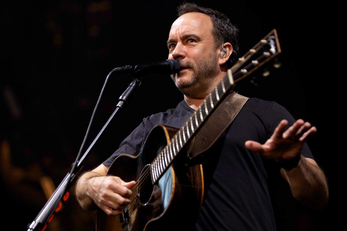 Dave Matthews jokes about “easing in” and “easing out” after the first song of their show at Raleigh, N.C.’s Coastal Credit Union at Walnut Creek, Friday night, June 14, 2024.