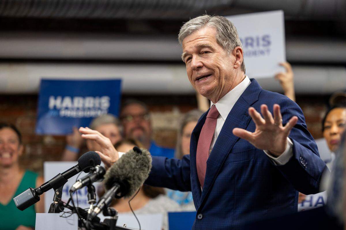 Gov. Roy Cooper speaks during a Harris campaign event in Raleigh on Thursday, July 25, 2024.