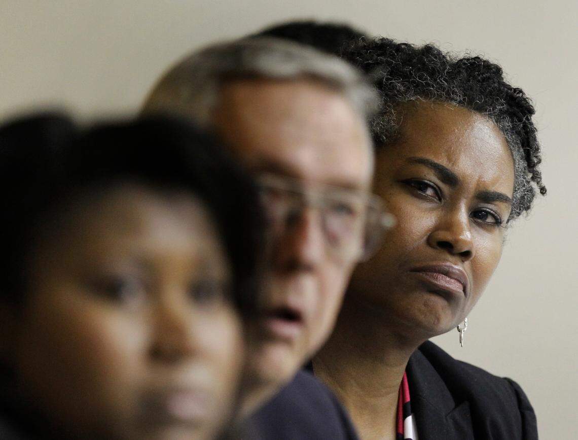 Dr. Laura Gerald (right) listens as Mary English recounts her forced sterilization to the crowd during the Eugenics Task Force Listening Session Wednesday June 22, 2011 in Raleigh
