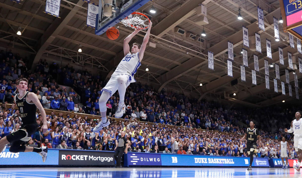 Duke’s Kyle Filipowski (30) slams in two late in the second half during Duke’s 75-73 victory over Wake Forest at Cameron Indoor Stadium in Durham, N.C., Tuesday, Jan. 31, 2023.